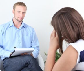 Woman with problem on reception for psychologist